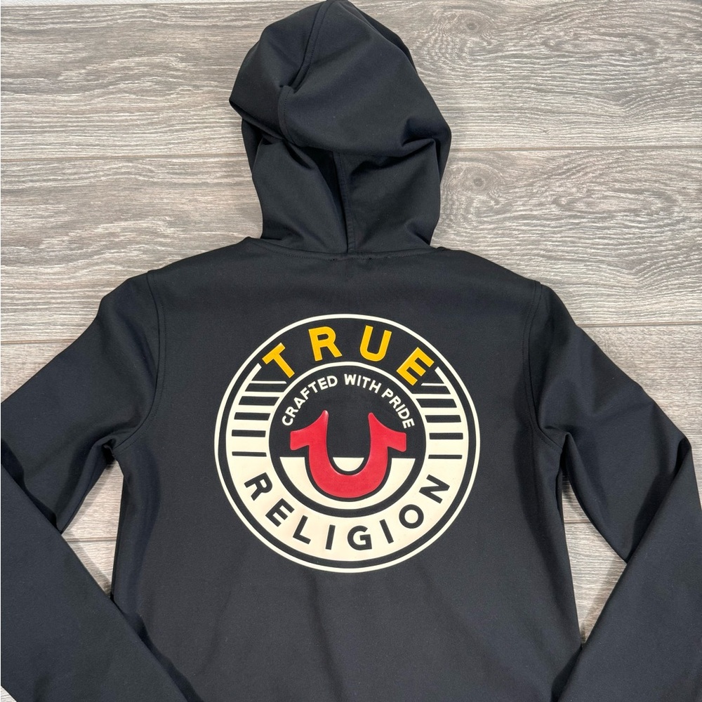 Women’s True Religion zip up jacket.